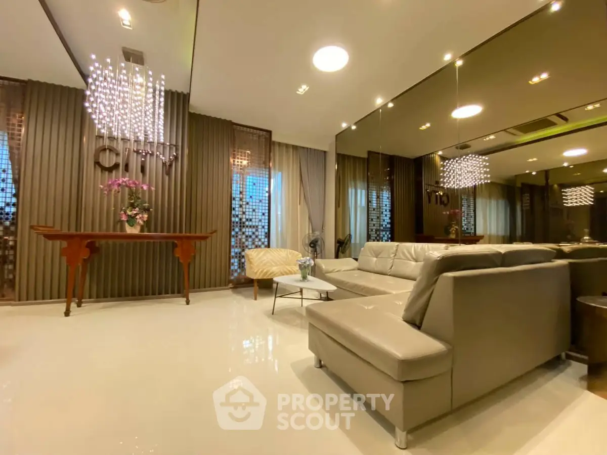 Luxurious modern living room with elegant lighting and plush seating