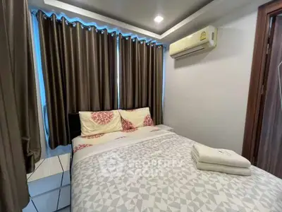 Cozy bedroom with modern decor and air conditioning