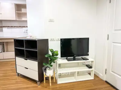 Modern living room with sleek TV stand and stylish shelving unit