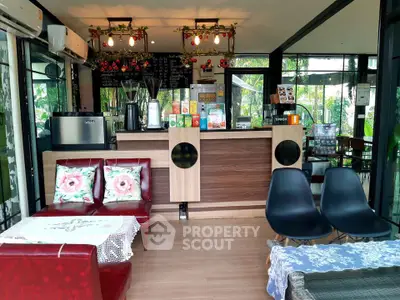 Charming cafe-style interior with cozy seating and modern decor