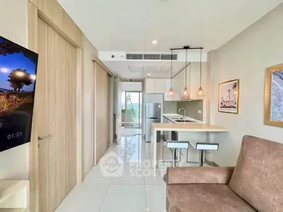 Modern living room with open kitchen and stylish decor