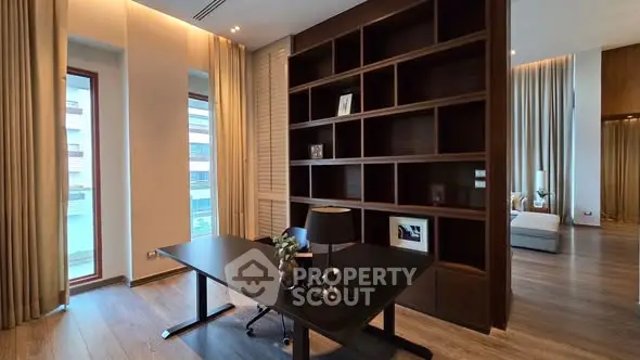 Luxurious home office with elegant wooden shelving and modern decor