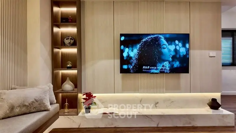 Modern living room with built-in TV and stylish decor