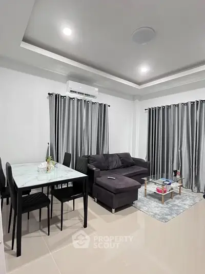 Modern living room with sleek furniture and elegant decor