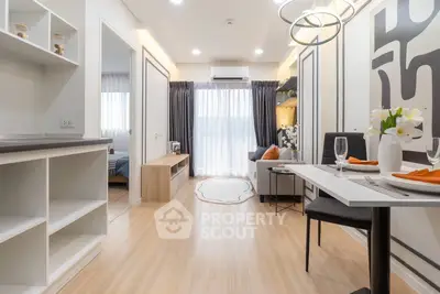 Modern open-plan living room with dining area and stylish decor