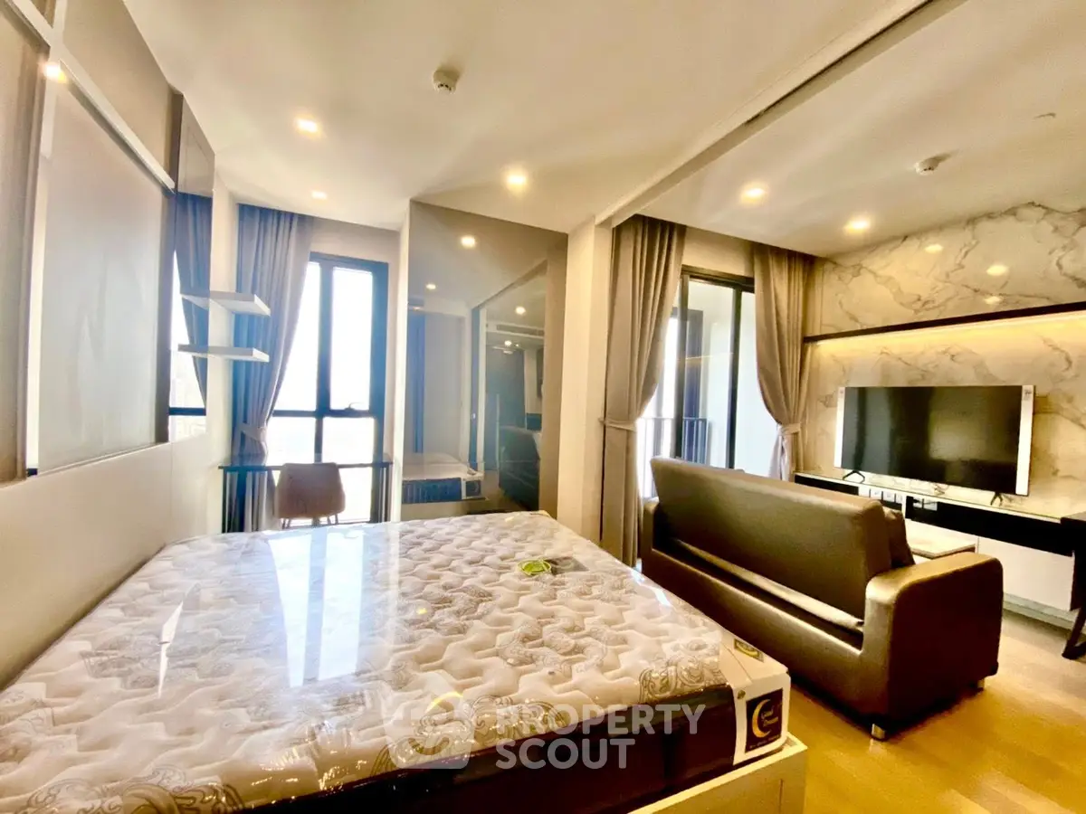 Modern studio apartment with stylish decor and natural light