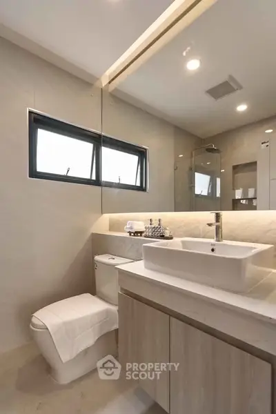 Modern bathroom with sleek fixtures and natural lighting