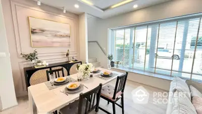 Elegant dining room with modern decor and large window view