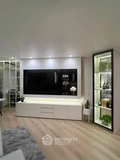 Modern living room with sleek TV unit and stylish decor