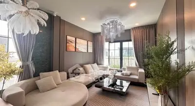 Luxurious living room with elegant decor and large windows