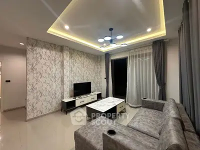 Modern living room with stylish furniture and elegant lighting