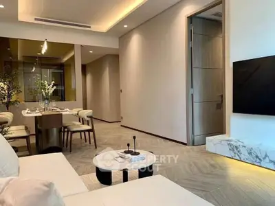 Modern living room with elegant dining area and stylish decor