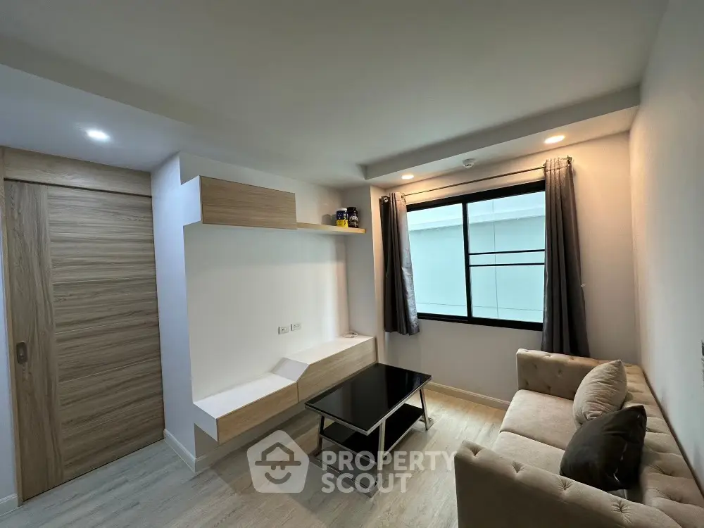 Modern living room with sleek design and natural light