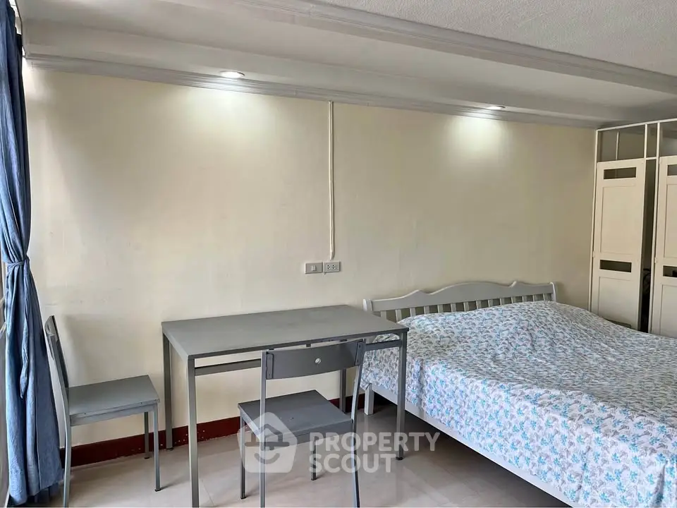 Cozy bedroom with modern furniture and natural light