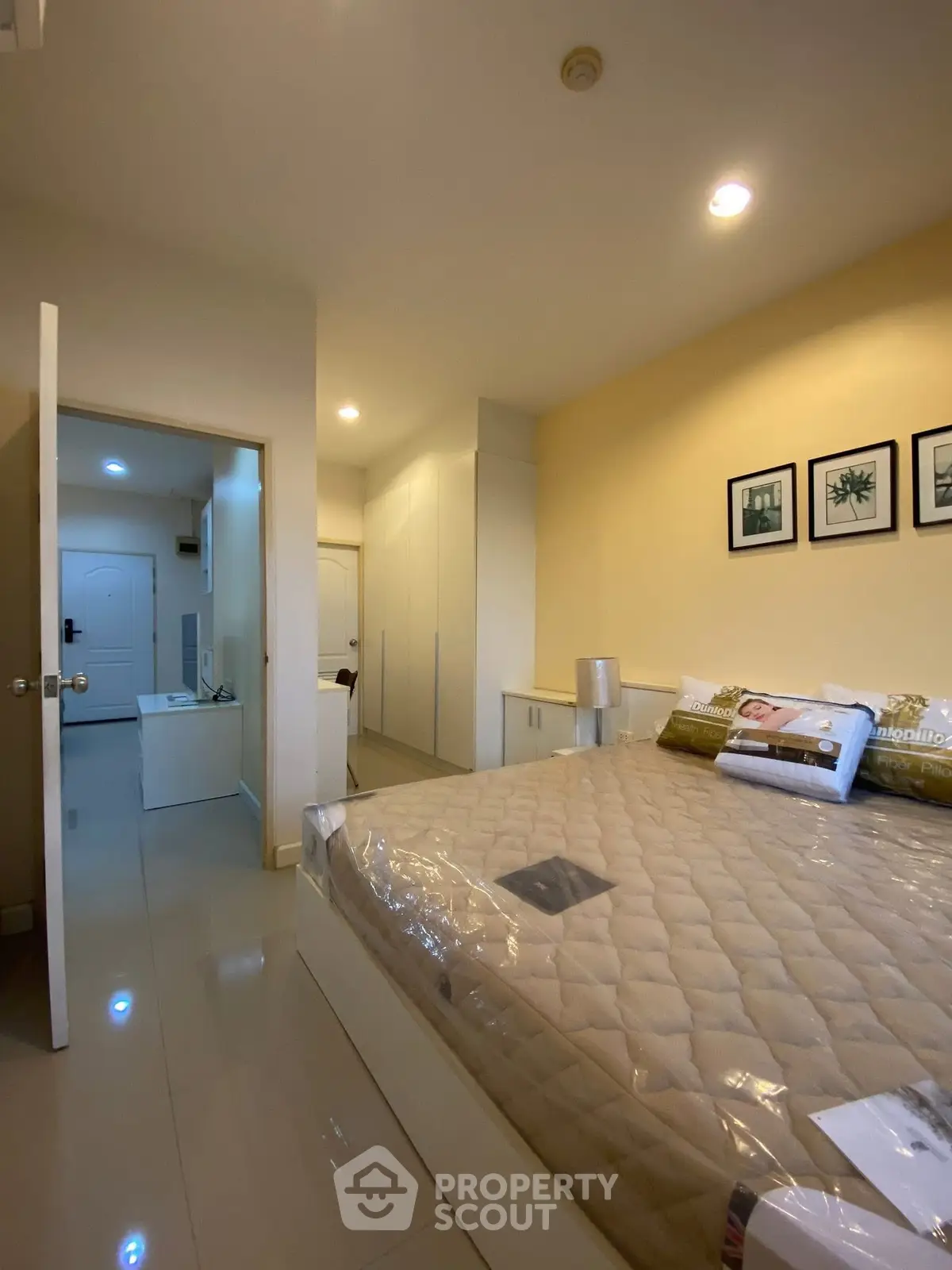 Cozy bedroom with modern decor and ample storage space