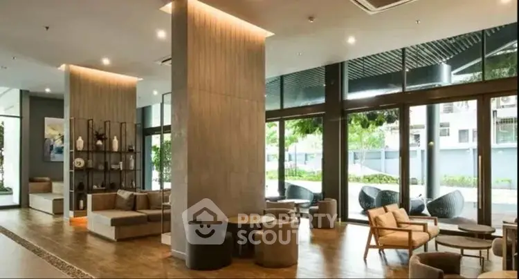 Luxurious modern living room with elegant furniture and large windows