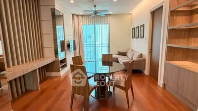 Modern living room with wooden flooring and stylish furniture