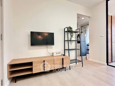 Modern living room with sleek TV setup and stylish wooden furniture