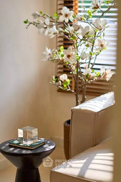 Elegant living room corner with stylish decor and natural light