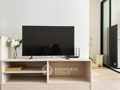 Modern living room with sleek TV setup and minimalist decor