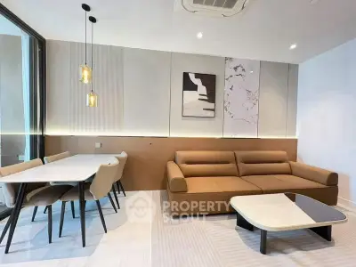 Modern living room with stylish furniture and elegant lighting