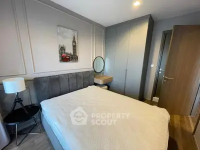 Modern bedroom with stylish decor and built-in wardrobe