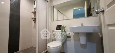 Modern bathroom with sleek fixtures and stylish tile accents