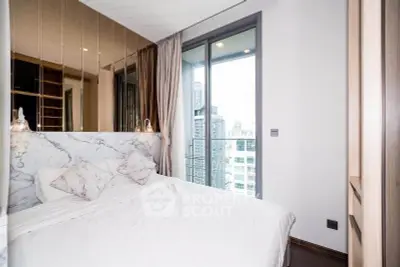 Luxurious bedroom with city view and elegant marble accents