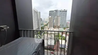 Stunning city view from modern balcony in high-rise apartment