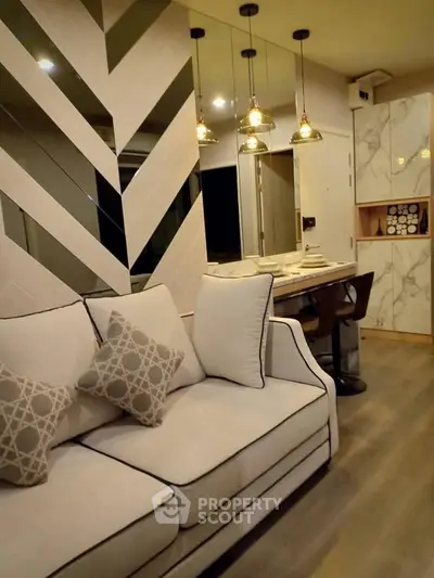 Modern living room with elegant sofa and stylish dining area