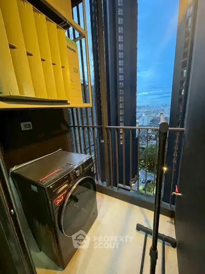 Modern balcony with washing machine and city view, perfect for urban living.