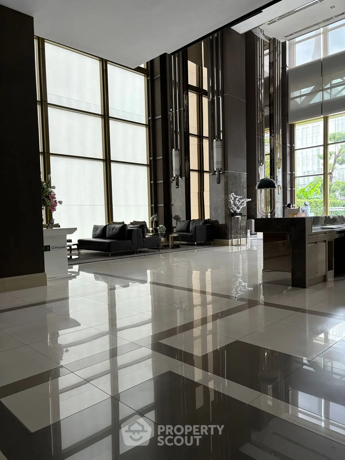 Luxurious modern lobby with high ceilings and elegant decor