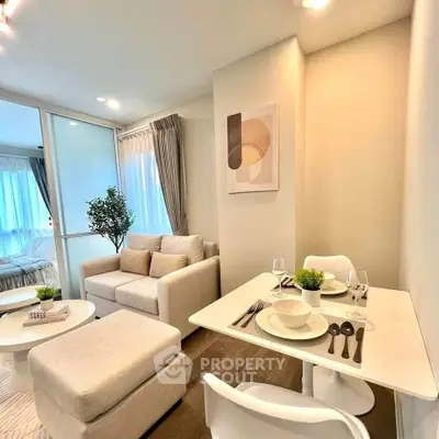 Modern living room with cozy seating and dining area in a bright apartment