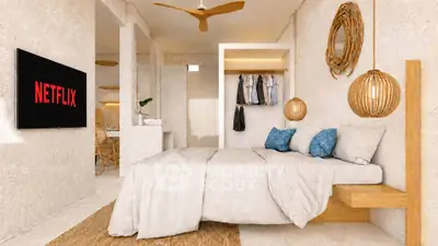 Modern bedroom with stylish decor, cozy bed, and wall-mounted TV for ultimate relaxation.
