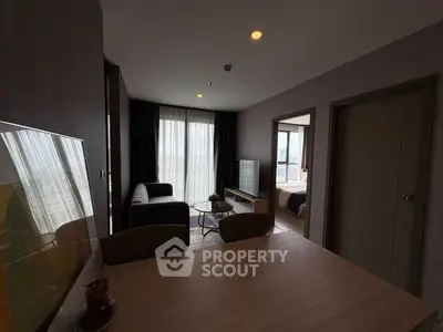 Modern apartment interior with cozy living room and bedroom view