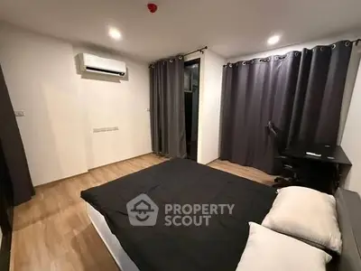 Modern bedroom with sleek design and cozy ambiance