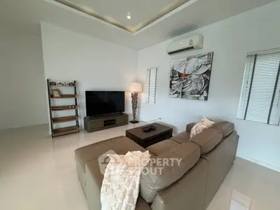 Modern living room with sleek furniture and stylish decor