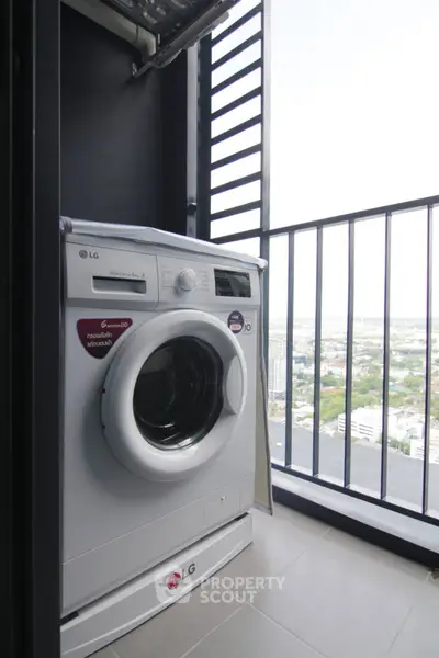 Modern balcony with washing machine and stunning city view