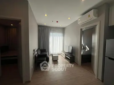 Modern living room with sleek furniture and natural light