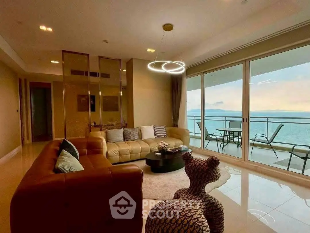 Luxurious living room with stunning ocean view and spacious balcony