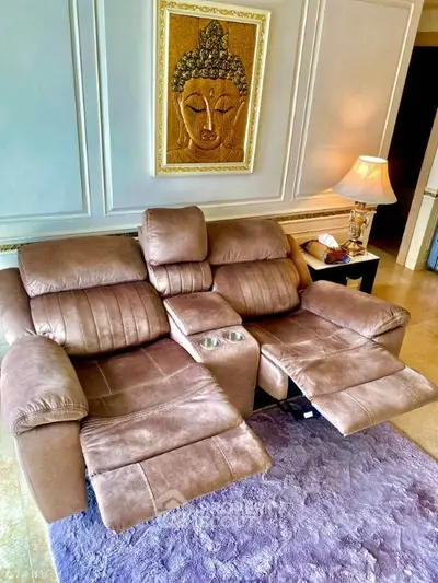 Luxurious living room with plush reclining sofa and elegant decor