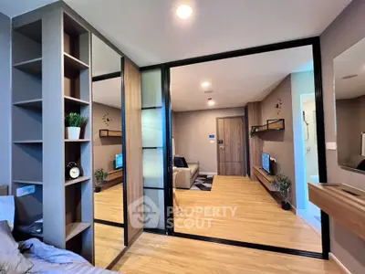 Modern living room with sliding glass doors and stylish decor