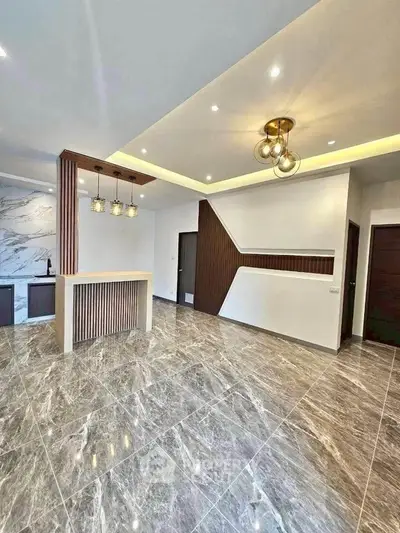 Luxurious modern living room with marble flooring and elegant lighting