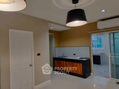 Modern kitchen with sleek design and open layout in a contemporary home