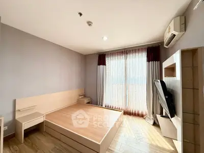 Spacious bedroom with modern design and natural light