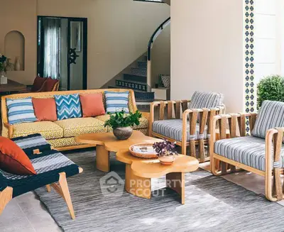 Stylish living room with modern furniture and vibrant decor in a contemporary home.