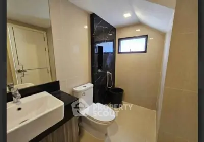 Modern bathroom with sleek design and natural light
