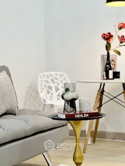 Stylish modern living room with elegant decor and cozy seating area.