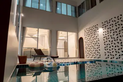 Luxurious indoor pool with modern design and ambient lighting