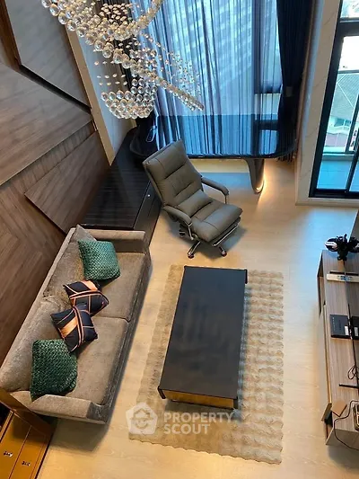 Luxurious living room with modern decor and large window view